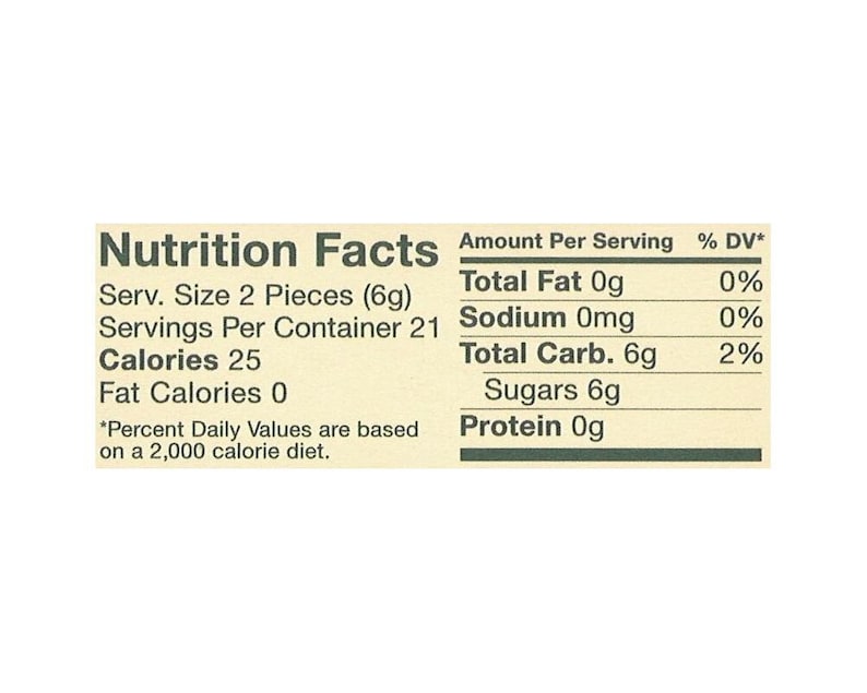 May include: Nutrition Facts label for a food product with 25 calories per serving. The serving size is 2 pieces (6 grams) and the container has 21 servings. The label lists the amount of total fat, sodium, total carbohydrates, sugars, and protein per serving, along with the percentage of daily value for each nutrient.