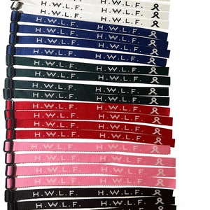 May include: A set of 16 colorful wristbands with the text "H.W.L.F." and a white ribbon symbol printed on each band.