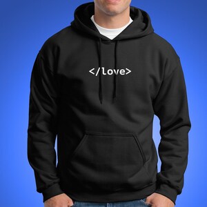 May include: Black hooded sweatshirt with white text that reads "</love>" on the front.
