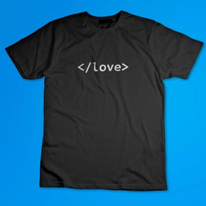 May include: Black t-shirt with white text that reads "</love>"