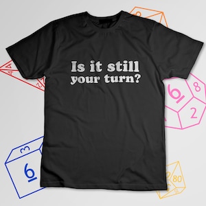 Is it still your turn? with center aligned text Funny Board Game shirt with meeple design for the impatient gamerShort-Sleeve Unisex T-Shirt