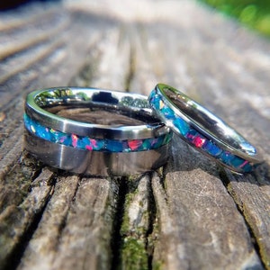 Titanium wedding band set with Ocean Sunset Fire Opal - opal wedding band set - his hers opal wedding bands