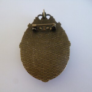 Grosse broche épingle bronze cabochon 30*40mm fillette dans le ciel - France