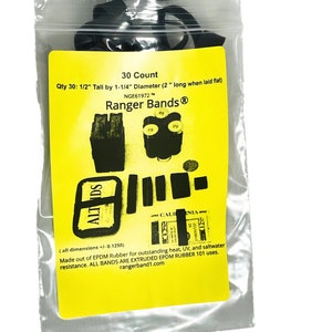 May include: A pack of 30 black rubber bands, each measuring 1.27 cm tall by 3.18 cm in diameter. The pack is labelled "30 Count Ranger Bands®" and includes the text "Qty 30: 1/2" Tall by 1-1/4" Diameter (2" long when laid flat) NGE61972™".