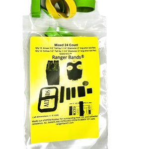 May include: A bag containing 24 assorted green and yellow rubber bands. The bag is labelled "Mixed 24 Count" and "Ranger Bands". The bands are 1.27 cm tall by 3.18 cm in diameter. The bag is made of clear plastic and has a yellow background with black text.