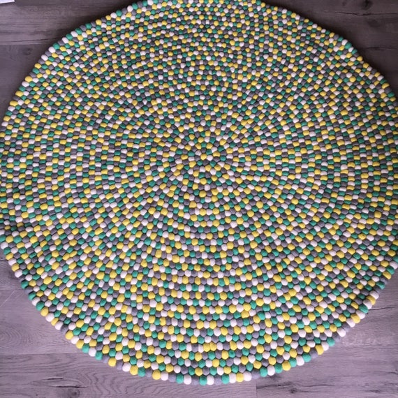 round navy rug nursery