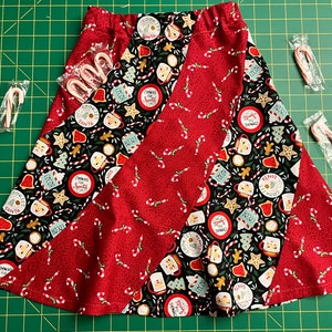 Girls spiral skirt PDF pattern for download. Sizes 4 to 6X. Sewing tutorial with cutting layouts. Made with Fat Quarters or Reg Fabrics.