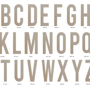 May include: A set of brown cardboard letters and ampersand, ranging in size from 8.8 cm to 30 cm. The letters are arranged in alphabetical order.