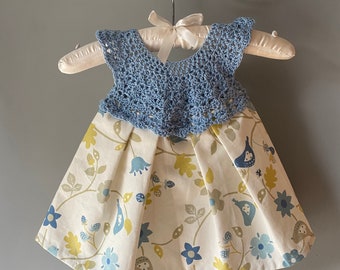 Baby dress 6- 9 months .