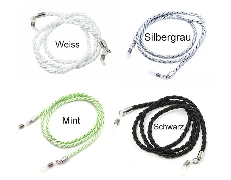 May include: Four different colors of braided eyeglass cords. The cords are white, silver gray, mint green, and black. Each cord has two metal clasps on the ends.