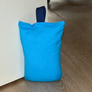 Tope de puerta para suelo, bolsa de tope de puerta aprox. Abrazadera de 1,5 kg para puerta, protección de puertas, tela de algodón, burlete, varios colores
