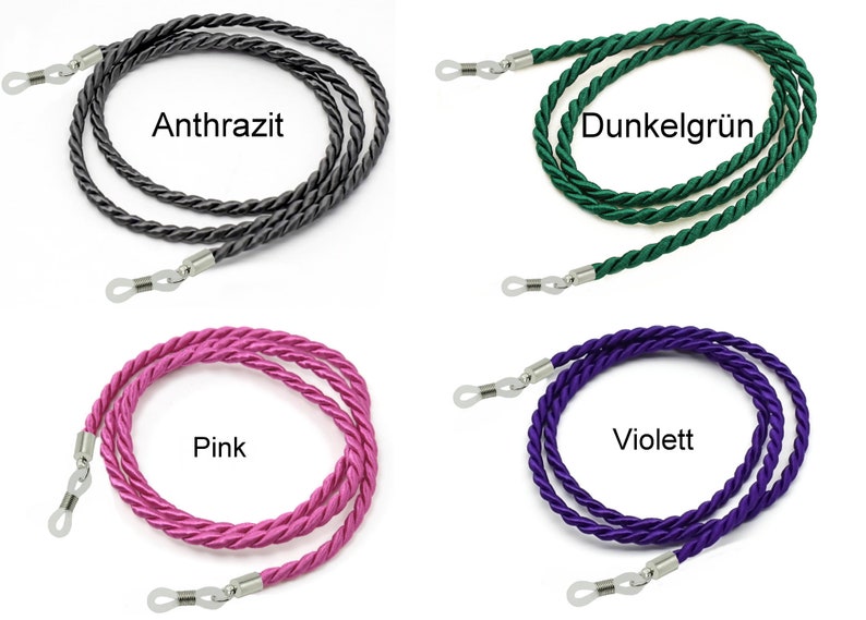 May include: Four different colors of eyeglass chains. The colors are anthracite, dark green, pink, and violet. Each chain has silver metal clasps on the ends.