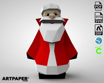 Puede incluir: Un modelo de papel de Papá Noel rojo y blanco. El modelo está hecho de papel doblado y tiene un efecto 3D. El modelo está de pie sobre un fondo blanco.