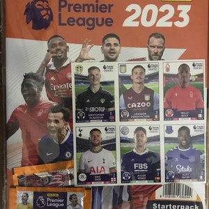 Album Panini Premier League anglaise 2023 à couverture souple avec 3 paquets (5 autocollants par paquet) + 6 autocollants supplémentaires. 100 % authentique