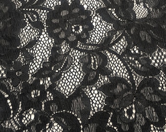 May include: Black lace fabric with a floral pattern.