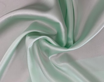 Pure silk satin with elastane Light menthol  color by the 50 cm