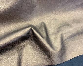 Thin bronze eco leather on a black viscose basis with elastane by Yard for dress ,trousers, skirt or jacket, elastic eco leather