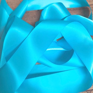 Turquoise satin ribbon  1 1/2”. Double face satin ribbon.