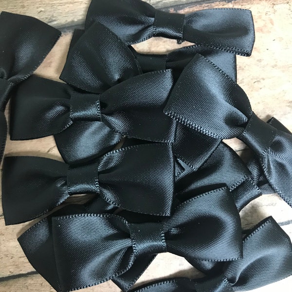 Black bows.  Satin black bow tie. Satin black bows.