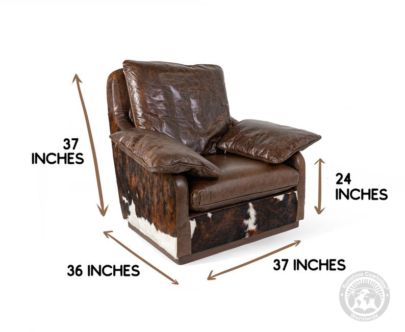May include: Brown leather armchair with a cowhide pattern on the base. The chair measures 37 inches tall, 36 inches wide, and 37 inches deep.