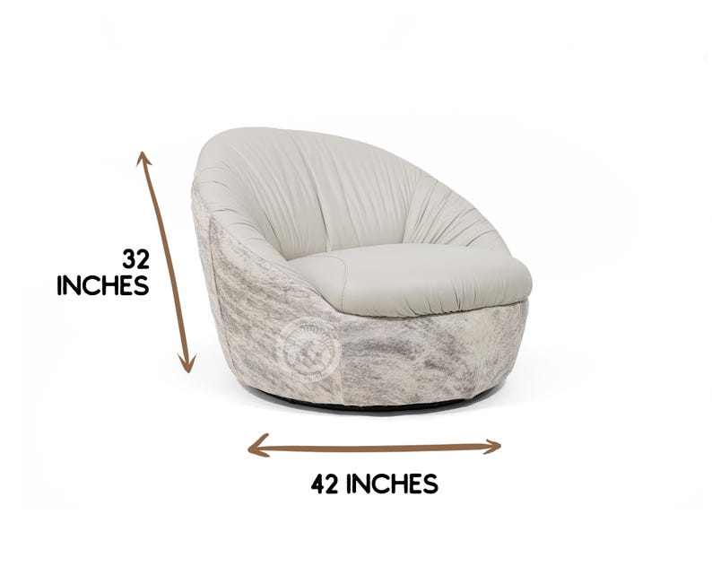 May include: A white leather swivel chair with a rounded back and a 32 inch height and 42 inch width.