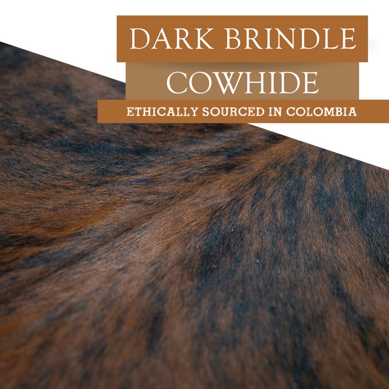 May include: Close-up of a dark brown cowhide with black markings. The hide has a soft, fuzzy texture. The text "DARK BRINDLE COWHIDE ETHICALLY SOURCED IN COLOMBIA" is displayed above the hide.