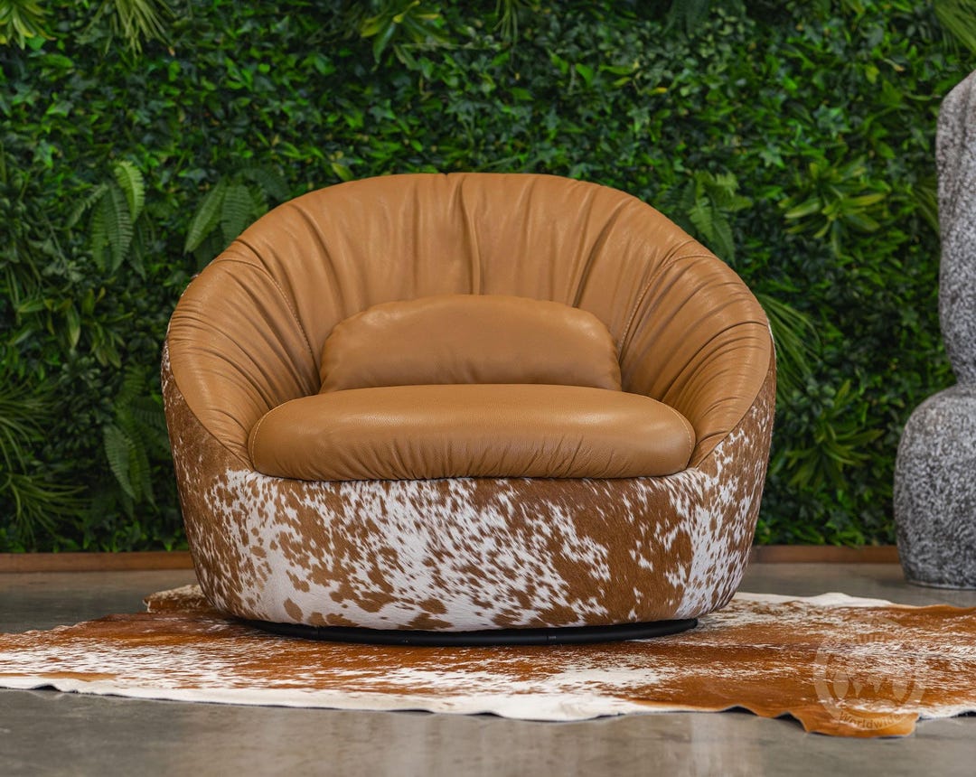 Cowhide Swivel Chaise Barrel Chair – Rustic Luxury Meets Modern