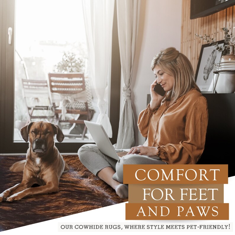 May include: A brown and white cowhide rug with a woman sitting on it using a laptop and talking on a cell phone. A brown dog is lying on the rug. The text on the image reads "Comfort for Feet and Paws. Our Cowhide Rugs, Where Style Meets Pet-Friendly!"