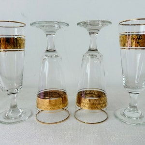 Vintage set of 4 gold rimmed glasses
