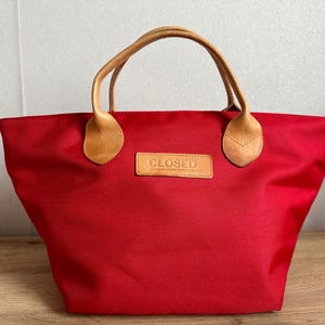 CLOSED red bag (1)