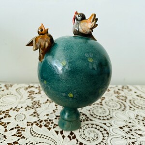 Vintage handmade ceramic ball with bird
