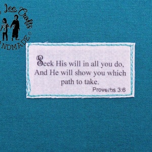 May include: White fabric label with a blue border and the text "Seek His will in all you do, And He will show you which path to take. Proverbs 3:6"