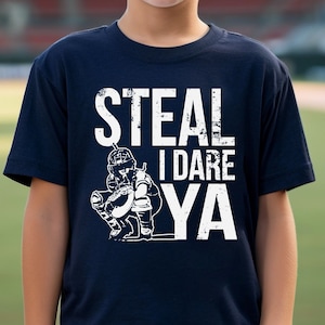 Steal I Dare Ya T-Shirt (YOUTH) | Softball Catcher | Softball Pitcher | Baseball Catcher | Funny Softball Shirt | Softball Coach Gift