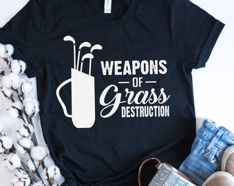 Armas de destrucción de la hierba - Divertido golfista terrible - Camiseta unisex de manga corta con el club de golf