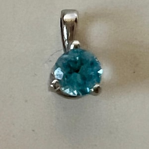 14kt White Gold Blue Topaz Pendant