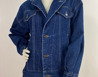 May include: A classic blue denim jacket with a button-up front and a collared neckline. The jacket has two flap pockets on the chest and two pockets at the waist.