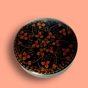 Vintage black lacquered box with hand painted decoration