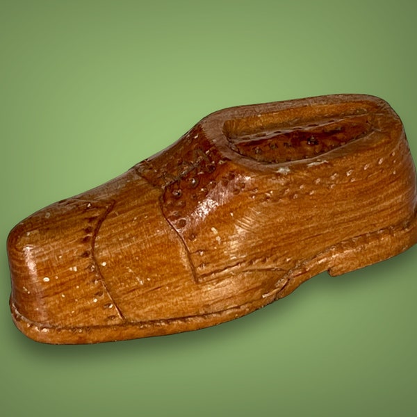 Vintage vesta case in the shape of a shoe