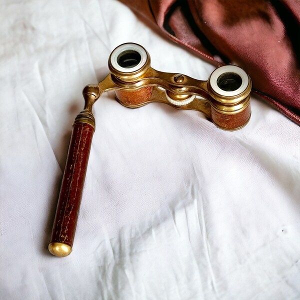 Antique opera glasses, brass and leather