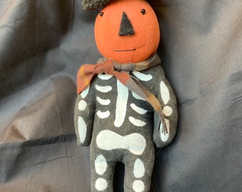 Primitive Pumpkin Man in Skeleton Costume Shelf Sitter