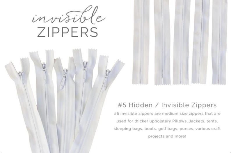 May include: White invisible zippers, ideal for various sewing projects. The image shows several zippers, with the text "invisible ZIPPERS" at the top. The text also mentions that these are medium-sized zippers.