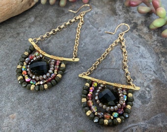 Stunning gemstone boho lux earrings .