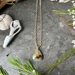 Sweet Chrysocolla gemstone pendant .