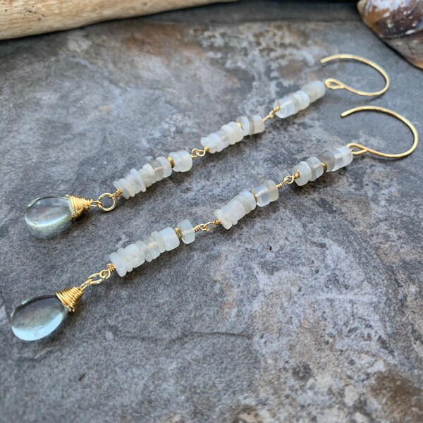 Gorgeous gemstone beaded dangle earrings .