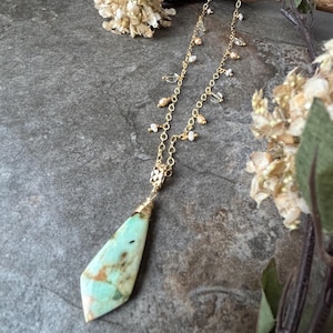 Gorgeous Crysocolla beaded gemstone pendant .