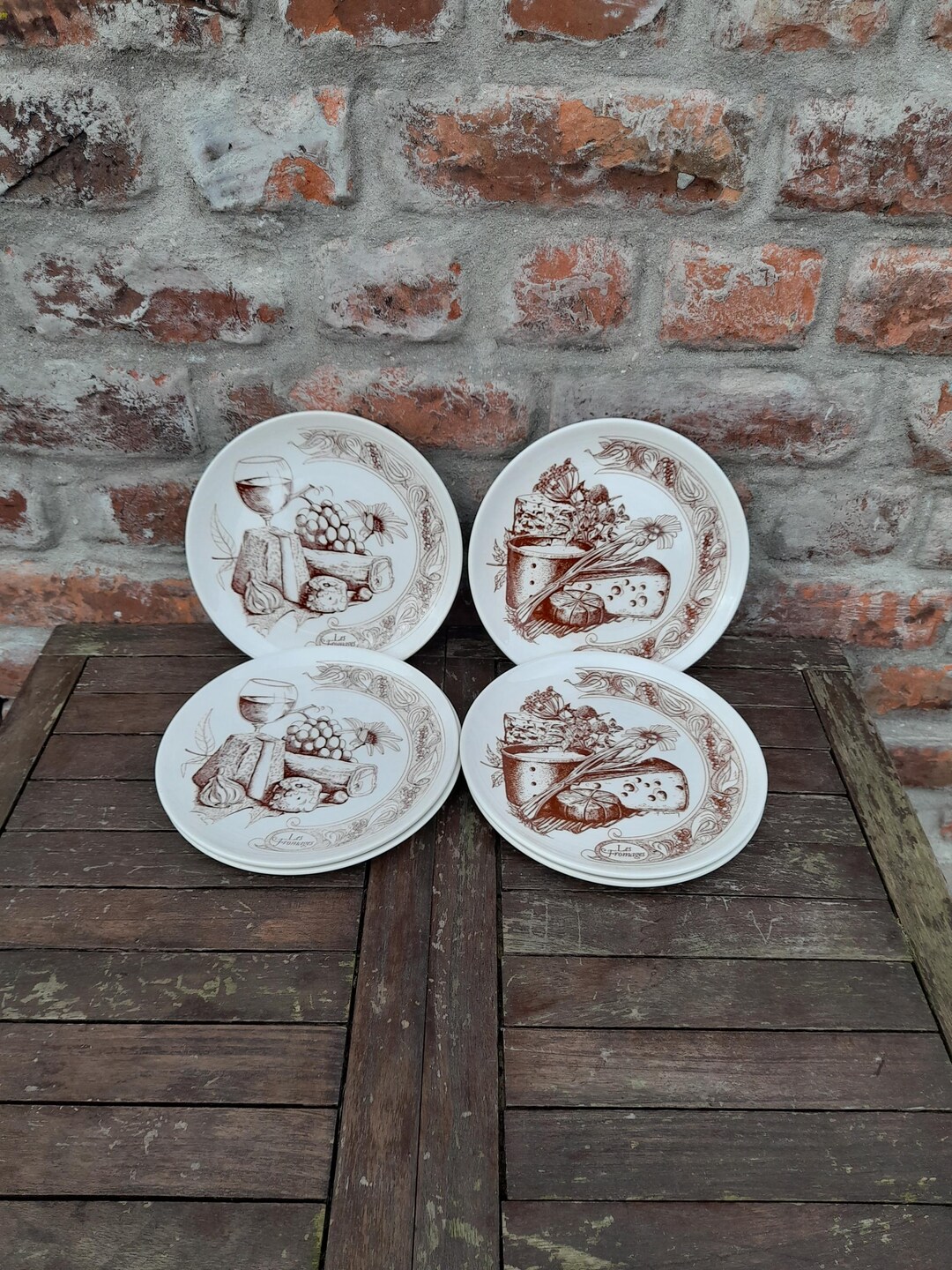Een set van 4 Japanse Imari porseleinen borden. - N.V. Veilinghuis