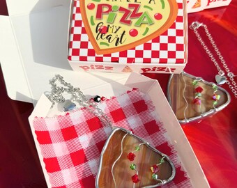 ¡Tienes una pizza, mi corazón! Dije de cristal para coche.