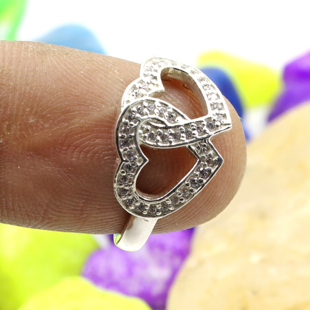 Buy 2hearts Ring Consisting of White Zircons Made in 925 Sterling