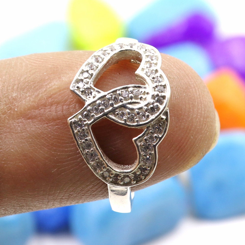 Buy 2hearts Ring Consisting of White Zircons Made in 925 Sterling