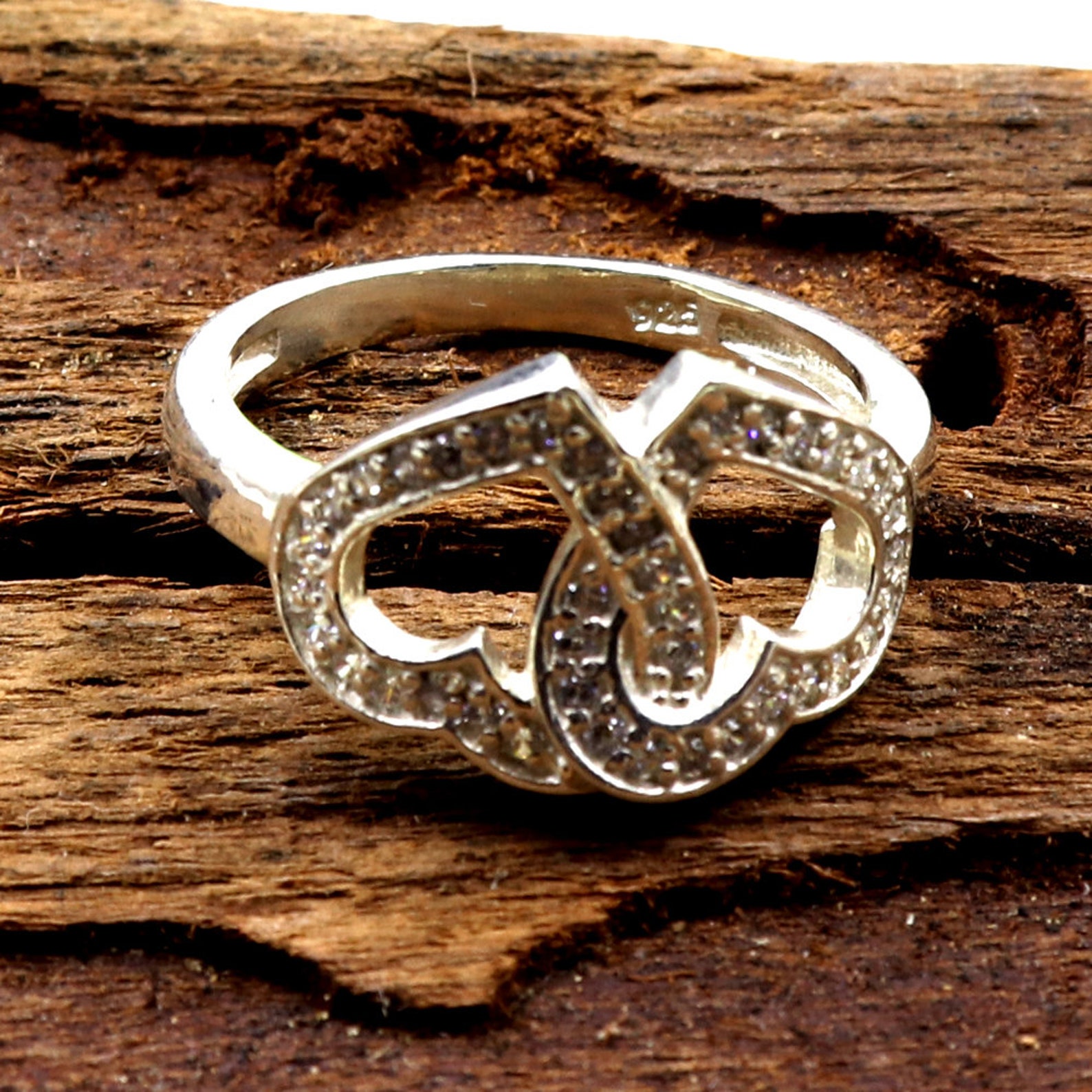 Buy 2hearts Ring Consisting of White Zircons Made in 925 Sterling